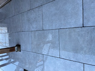 Stone patio maintenance — power washing